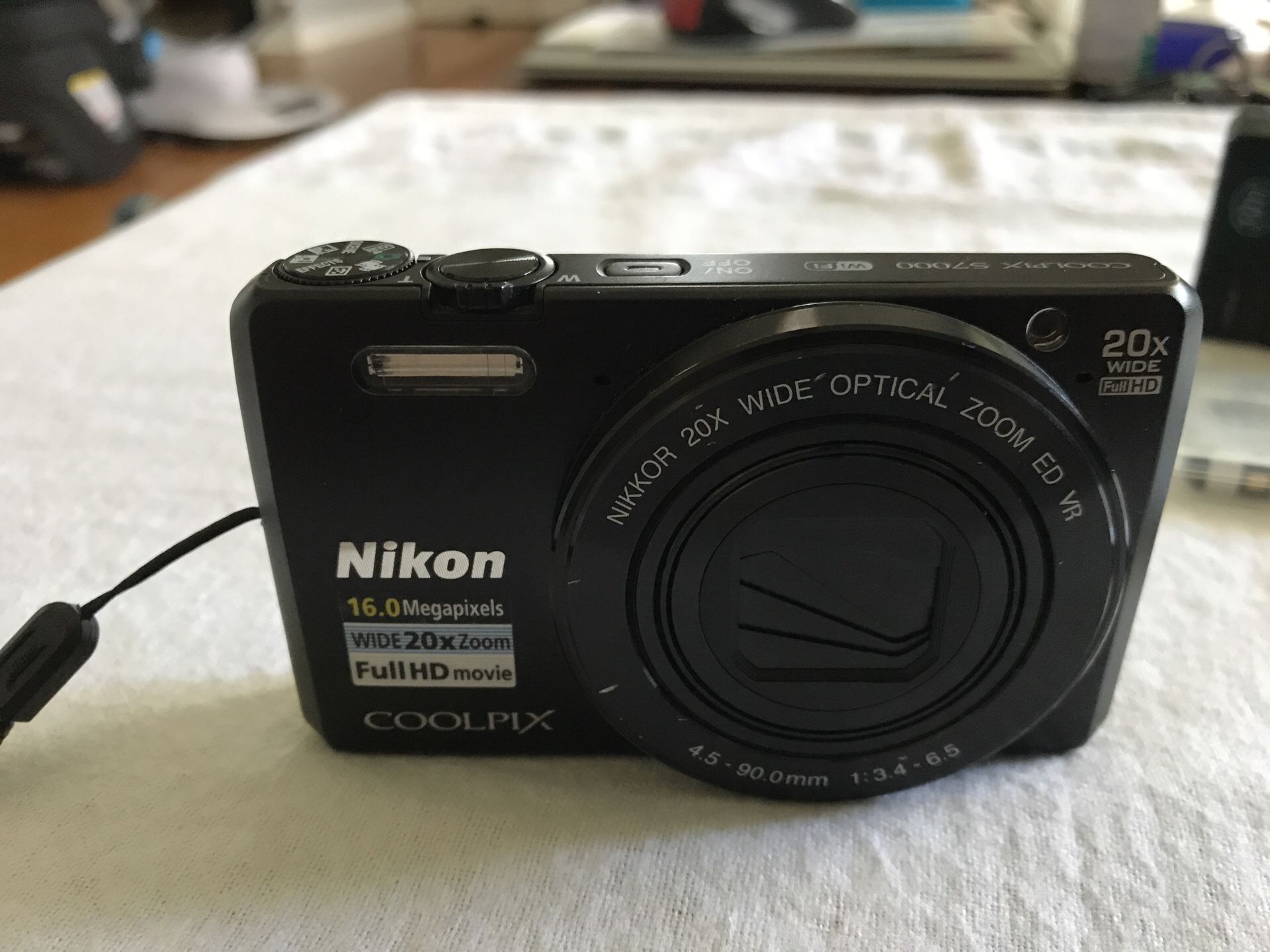 Nikon S7000 Coolpix with three batteries and charger