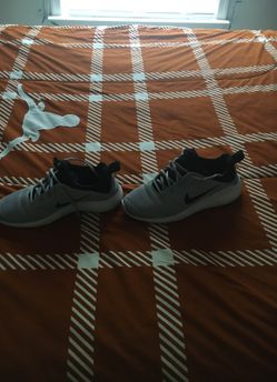 Grey and white nike