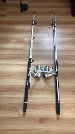 2 Ozark  trail  6000 fishing  poles  NEW
