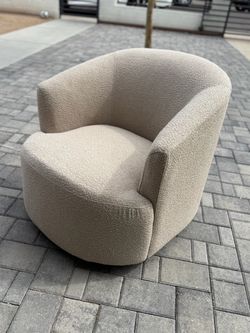 taupe bouclé swivel chair