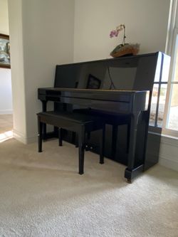 Upright Piano by Suzuki. Make an offer!