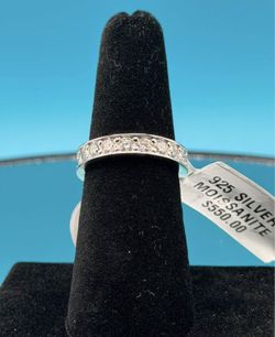 #- 157 Beautiful channel-set moissanite eternity band. Size 6