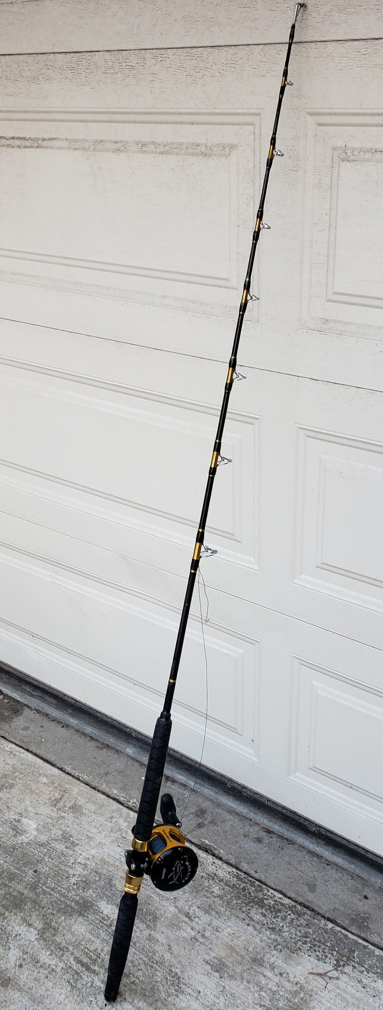 Okuma Makira 20 fishing reel & rod spooled with 120lb test line with costum 100lb rated rod.