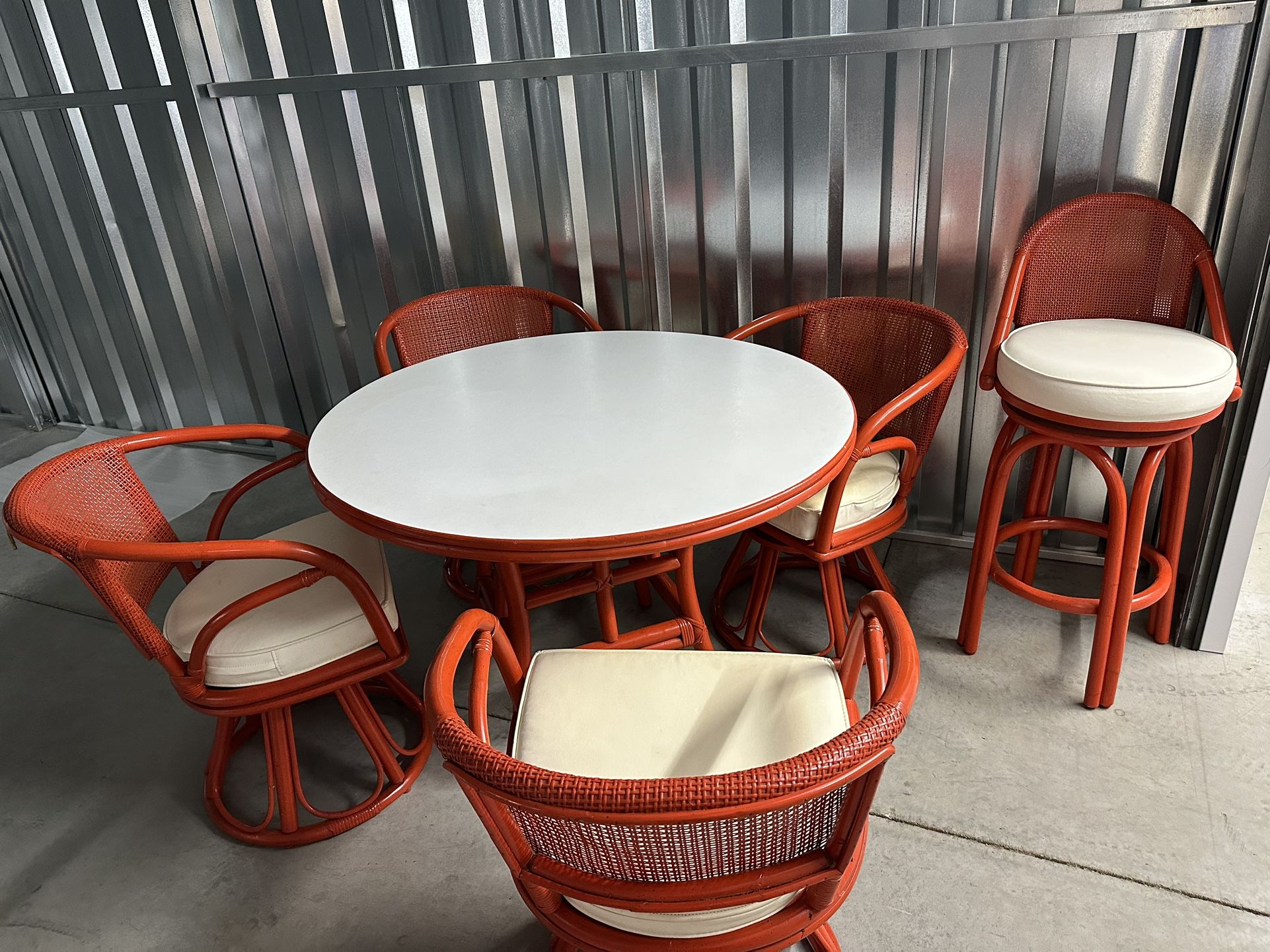 Ficks Reed Rattan 42” Table W/4 Swivel Chairs And 1 Bar Stool. Pretty Poppy Color