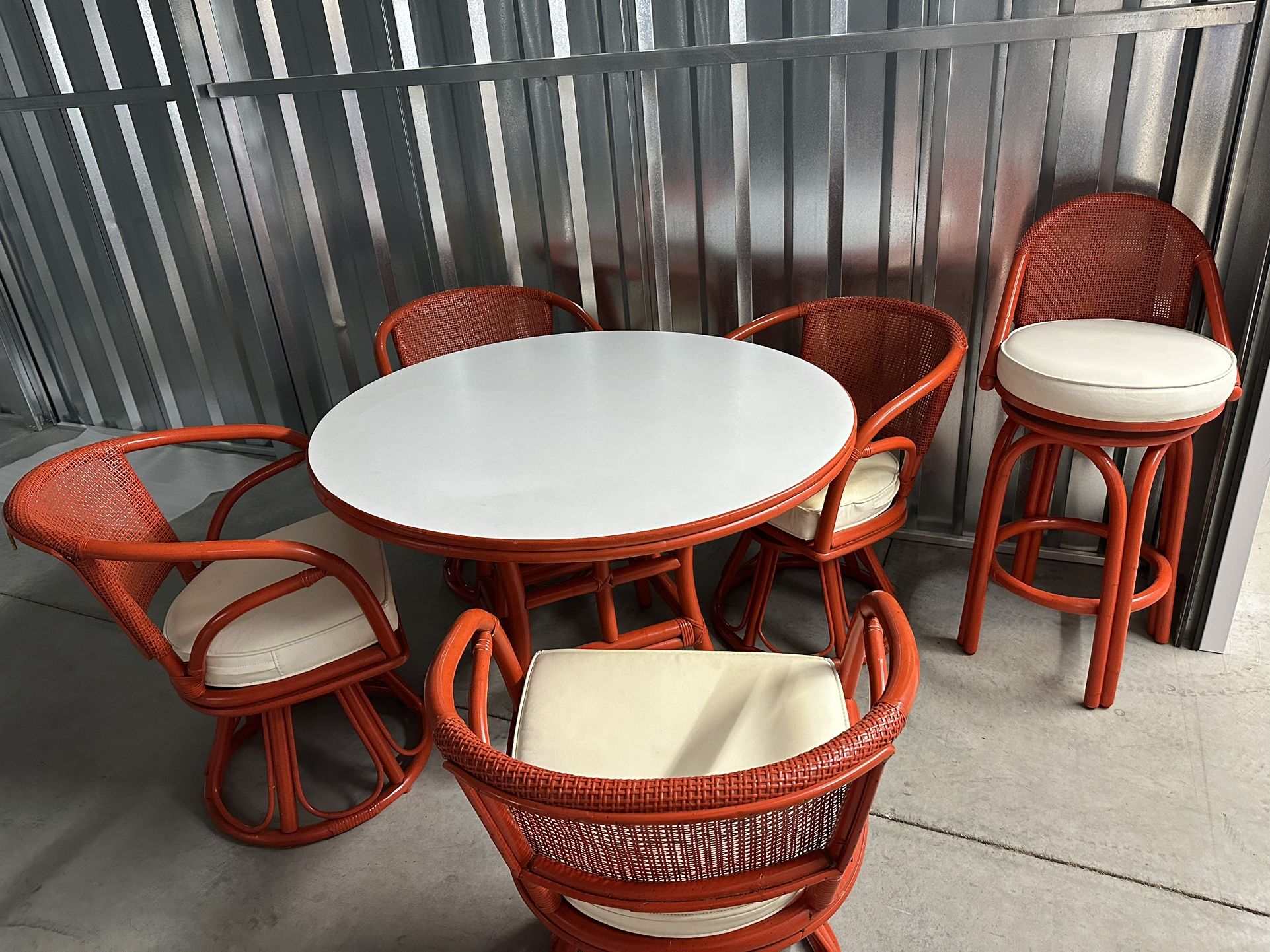 Ficks Reed Rattan  42” Table W/4 Swivel Chairs And 1 Bar Stool. Pretty Poppy Color 