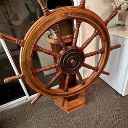 1947 Constellation And Antique Ship Wheel