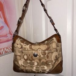 Vintage Coach optic print Chelsea hobo with a turnlock closure