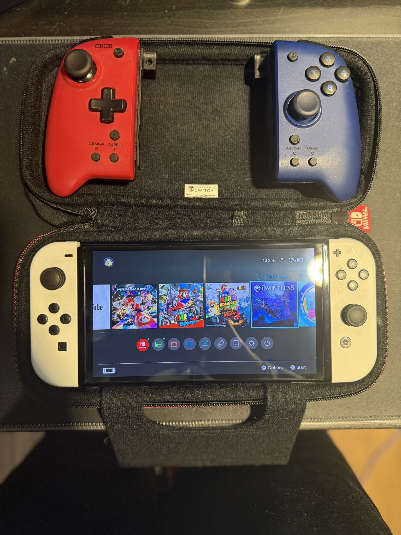 Nintendo switch OLED with case and controllers