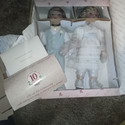 Brand New 10th Anniversary Porcelain Dolls