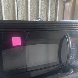 Black GE Microwave Over The Stove 