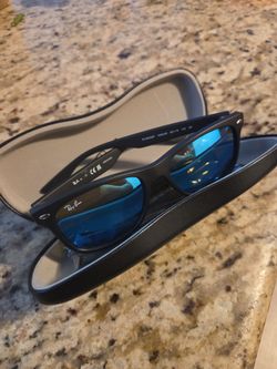 Ray-Ban Junior sunglasses, specifically the RB9052S New Wayfarer