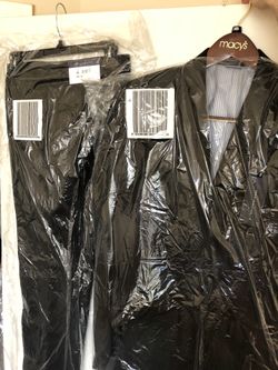 Tommy Hilfiger. Brand new black suit. 100% wool. Original +$600