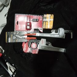 Misc. Things, 2 Pipe Wrenches, DeWalt 12v Battery, Milwaukee Headlamp 450, Klein Pliers 