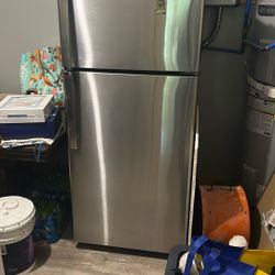 Stainless steel refrigerator year a year and a half old works great selling for $250