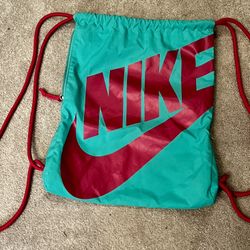 Nike graphic drawstring gym bag with side pocket