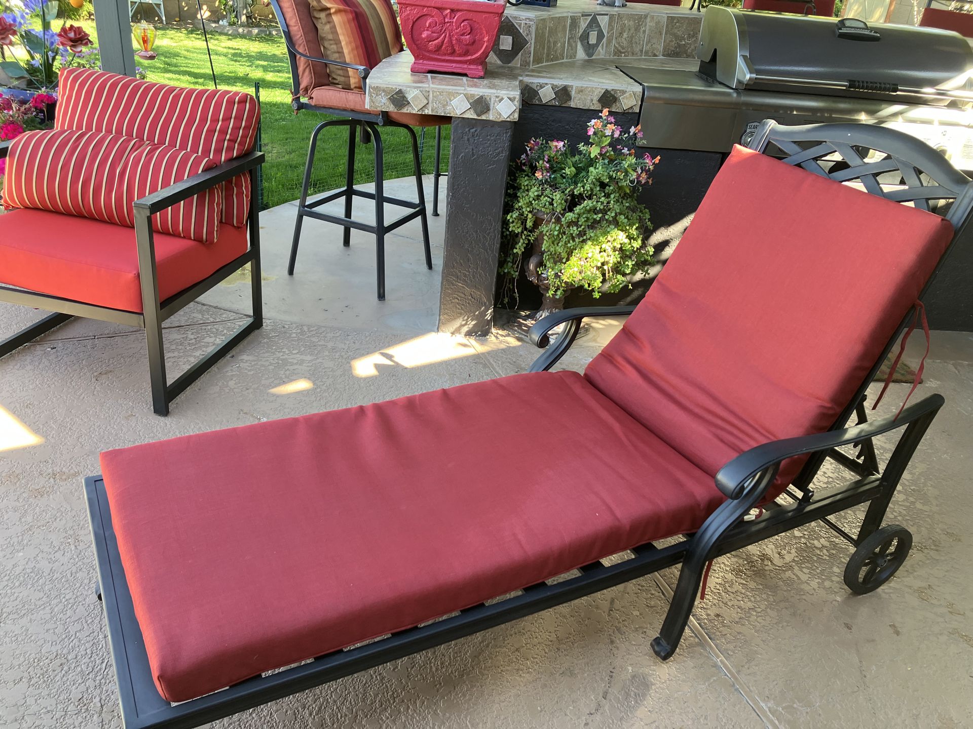 Patio/pool lounge chair with cushions either red or blue