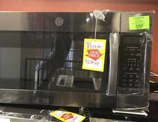 Brand New GE Over the Range Microwave XDP5Q
