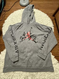 gray Air Jordan brand hoodie featuring the "Jumpman" logo graphic.  XL on tag