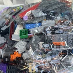 Two Gallon sized bags of LEGOS