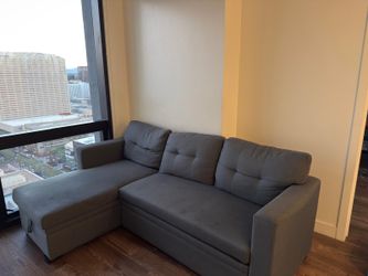 Reversible Sleeper Sectional Sofa With Storage Chaise