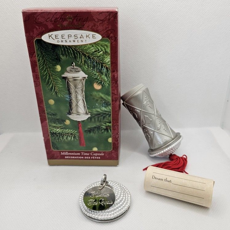 Time Capsule Ornament Hallmark Keepsake Silver Year 2000 Millennium Paper Inside
Box has some wear
Ornament in great condition the paper inside was