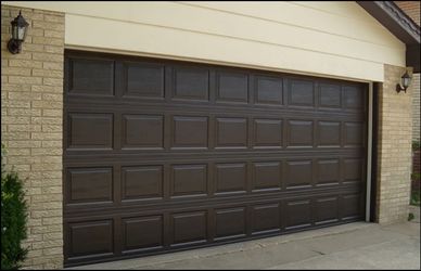 Beautiful short 16 x 7 garage door.