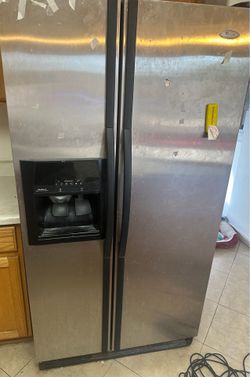 Used whirlpool refrigerator - 36in wide - no issues - fridge and freezer both cold