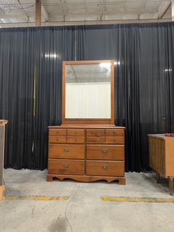 Reddish-Brown Wood Dresser with Attached Mirror