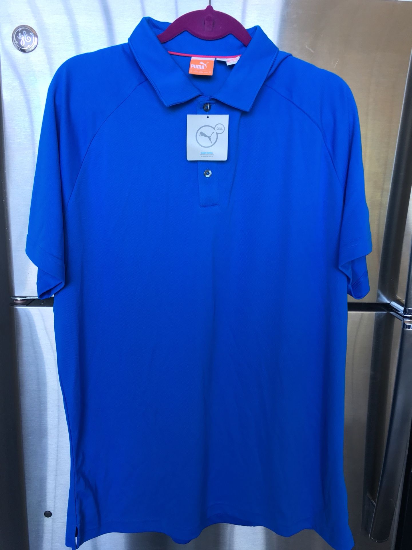 Puma men’s golf/tennis/polo shirt. Size XL. Moisture wicking technology.