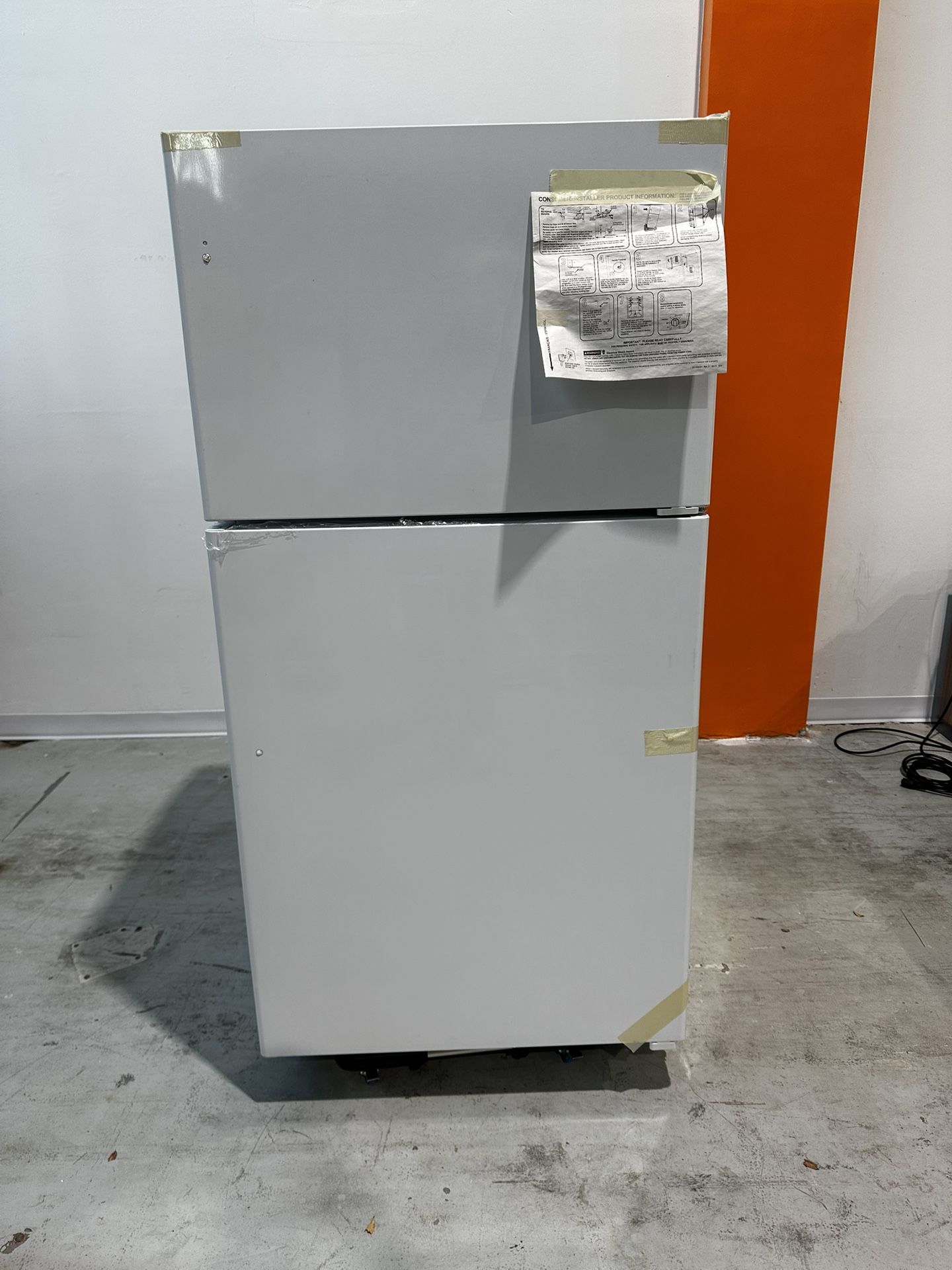 GE® 21.9 Cu. Ft. Garage Ready Top-Freezer Refrigerator