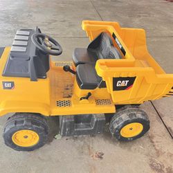 Power wheel Kid Trax mining dump truck