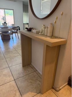 Entry door table $60 37 inch high 43 inch long