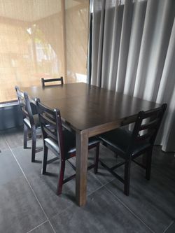 Mesa de comedor con extensión