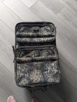 Suitcase With Wheels