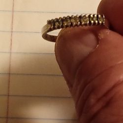 This is a vintage sterling silver ring with a 925 purity mark. 