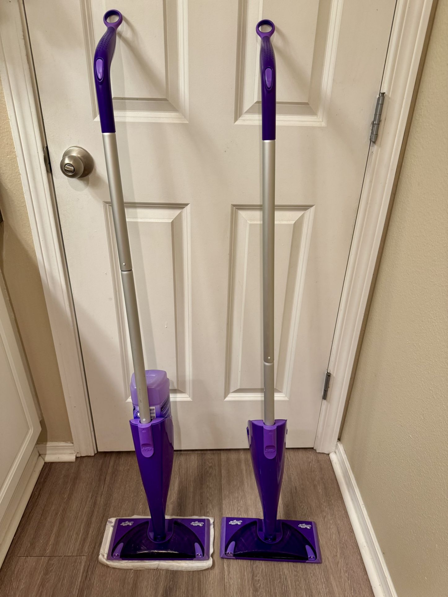 Purple Swiffer WetJet Mop Stick