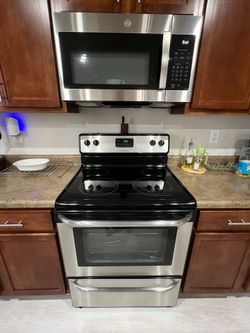 LG microwave 7 month newer perfect condition and Frigidaire stove in same condition .