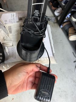 Shark charger for hand held vacuum