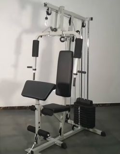 Everyday essentials home gym,  includes 125 pounds of weight