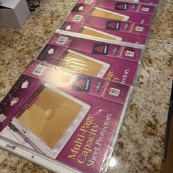 Sheet Protectors brand new five packs of 10 Office Depot