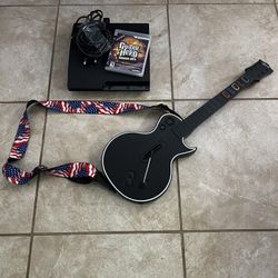 SONY PS3 Slim 160GB W/Guitar & Game