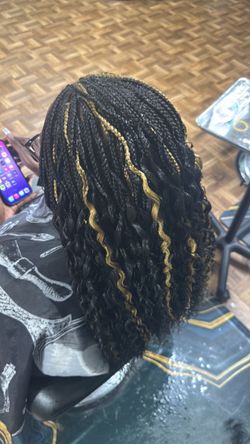 Mel hair braiding