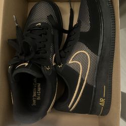 Nike Air Force 1 black/gold .