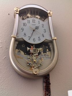 Rhythm Small World "CTS Carnival" Musical Motion Wall Clock
