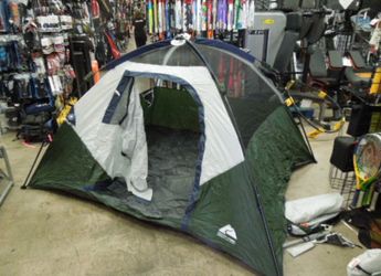 Used Ozark Trail 4 Person Instant Tent with Rain Cover, Stakes, and Carry Bag