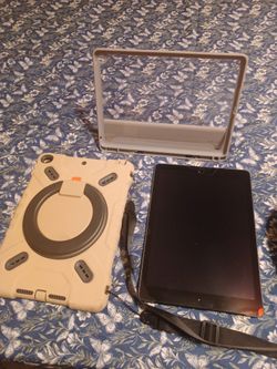 Apple iPad with Rugged Case and Stand, wifi and cellular, unlocked! stickers can be removed!