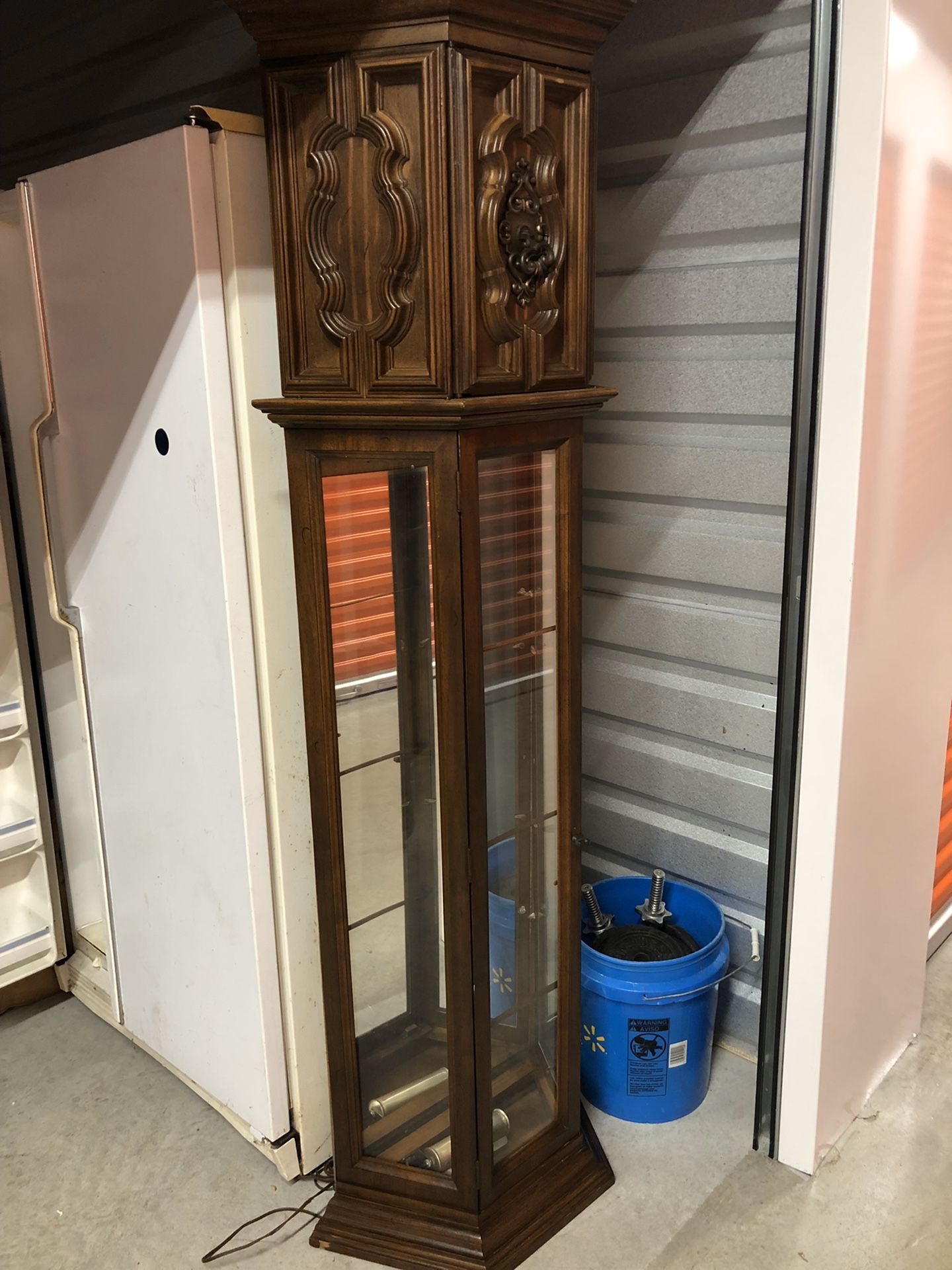 Antique curio display cabinet with mirrors and lighting