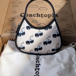 Coachtopia Black Cherry Ergo Purse