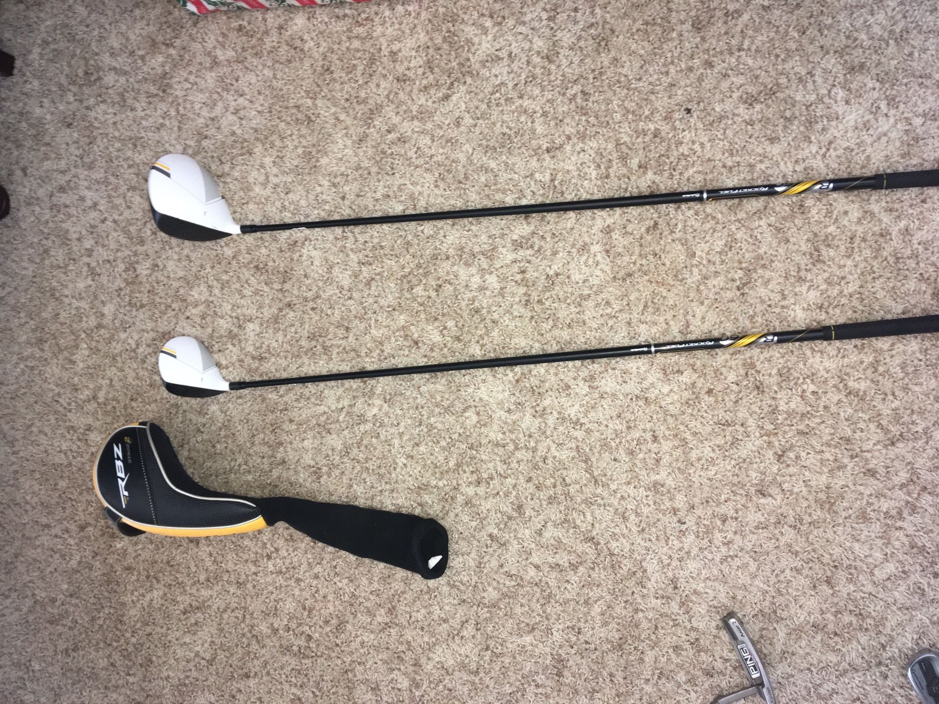 TaylorMade golf club set. Includes pitching wedge, sand wedge, 49 irons, rbz driver, rbz 3
