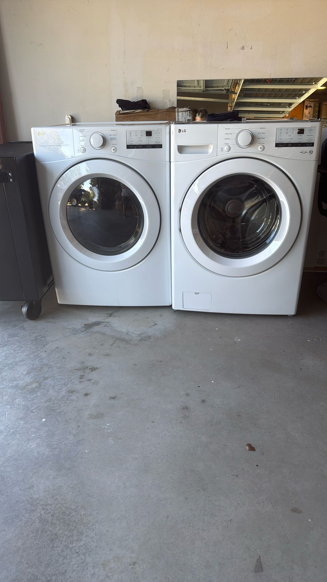 LG washer and dryer stackable or side-by-side one year and six months old in fantastic condition